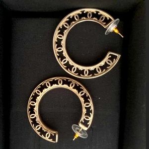 Authentic Chanel gold tone Hoop earrings.  Pre-owned Like new.